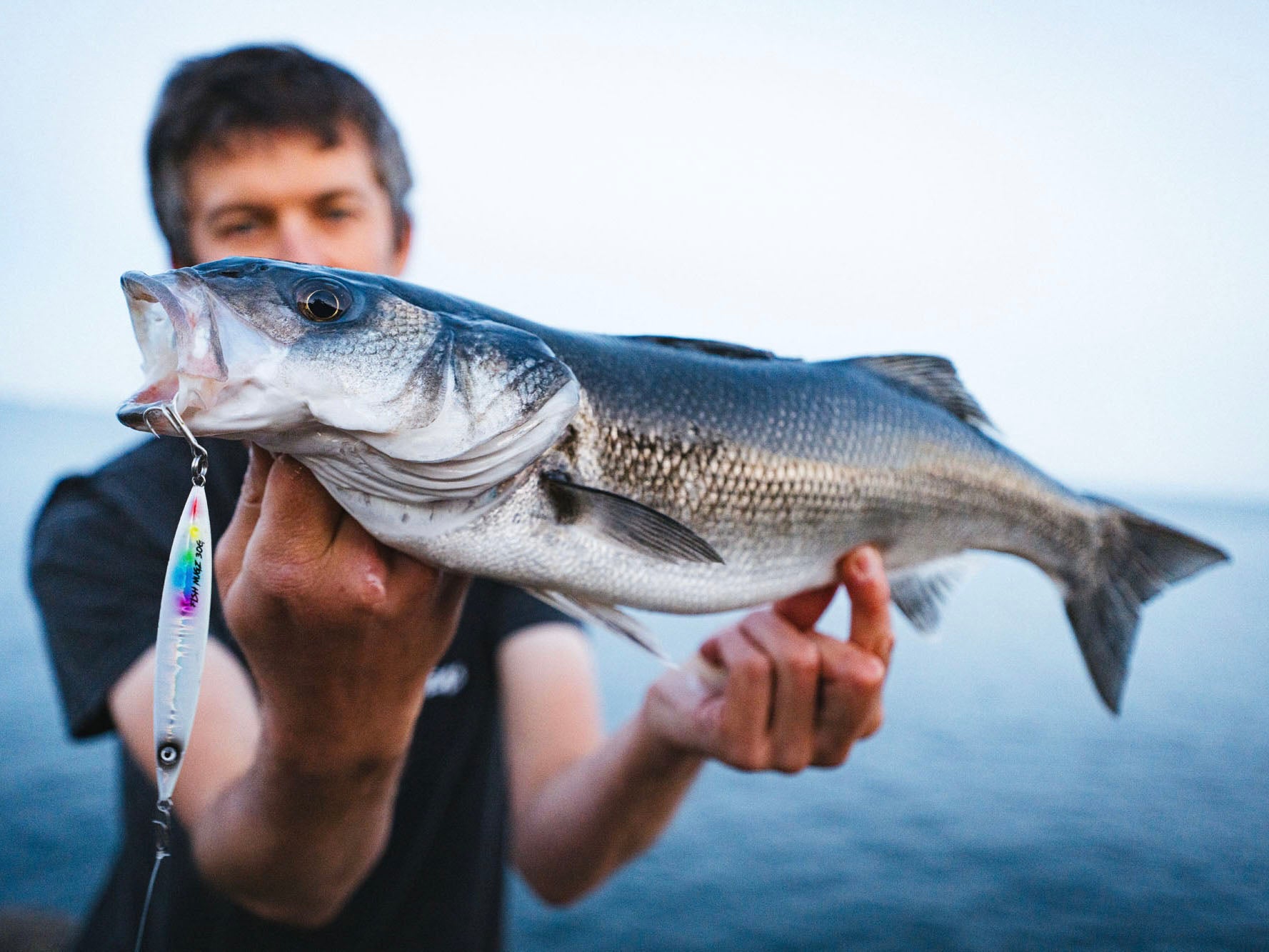 A Bass caught using the Fish Nugz Slayer Cast Metal Jig when shore fishing
