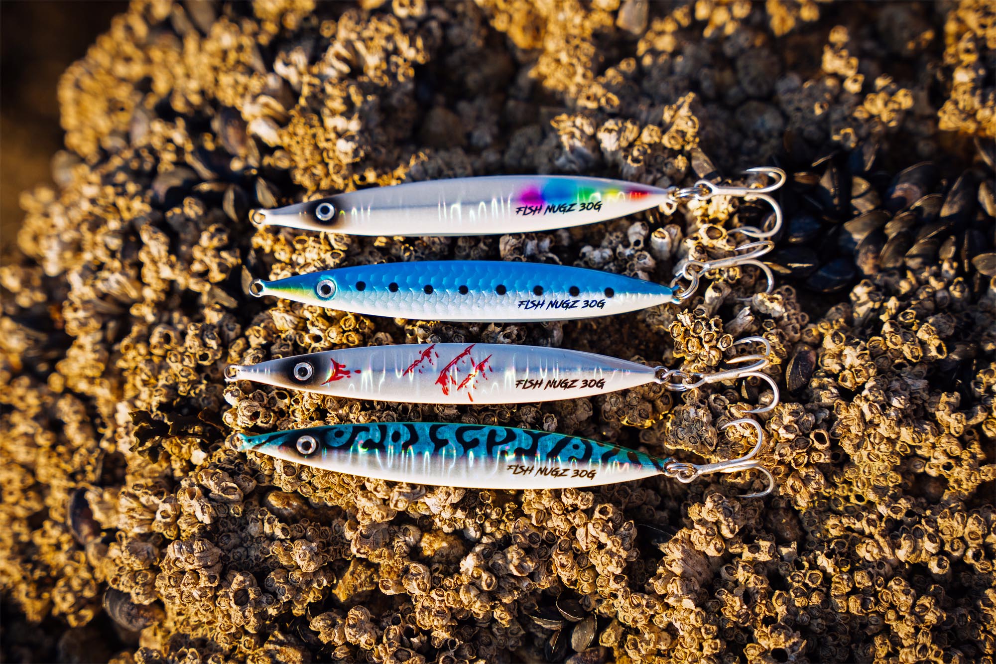 Fish Nugz Slayer Cast 30g Jig Pack displayed on rocks whilst fishing