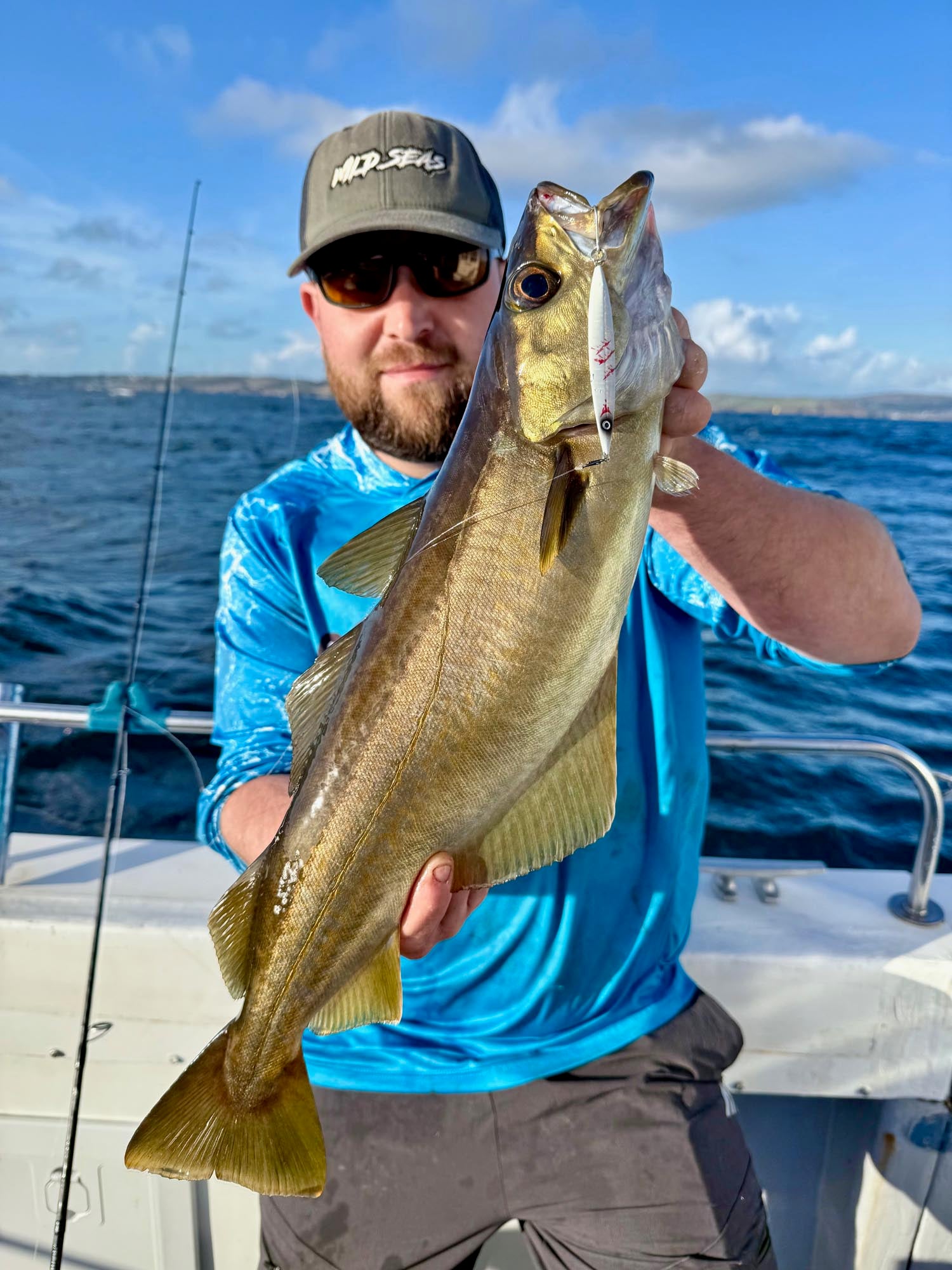 A Pollack caught on a boat using the Fish Nugz Slayer Cast jig
