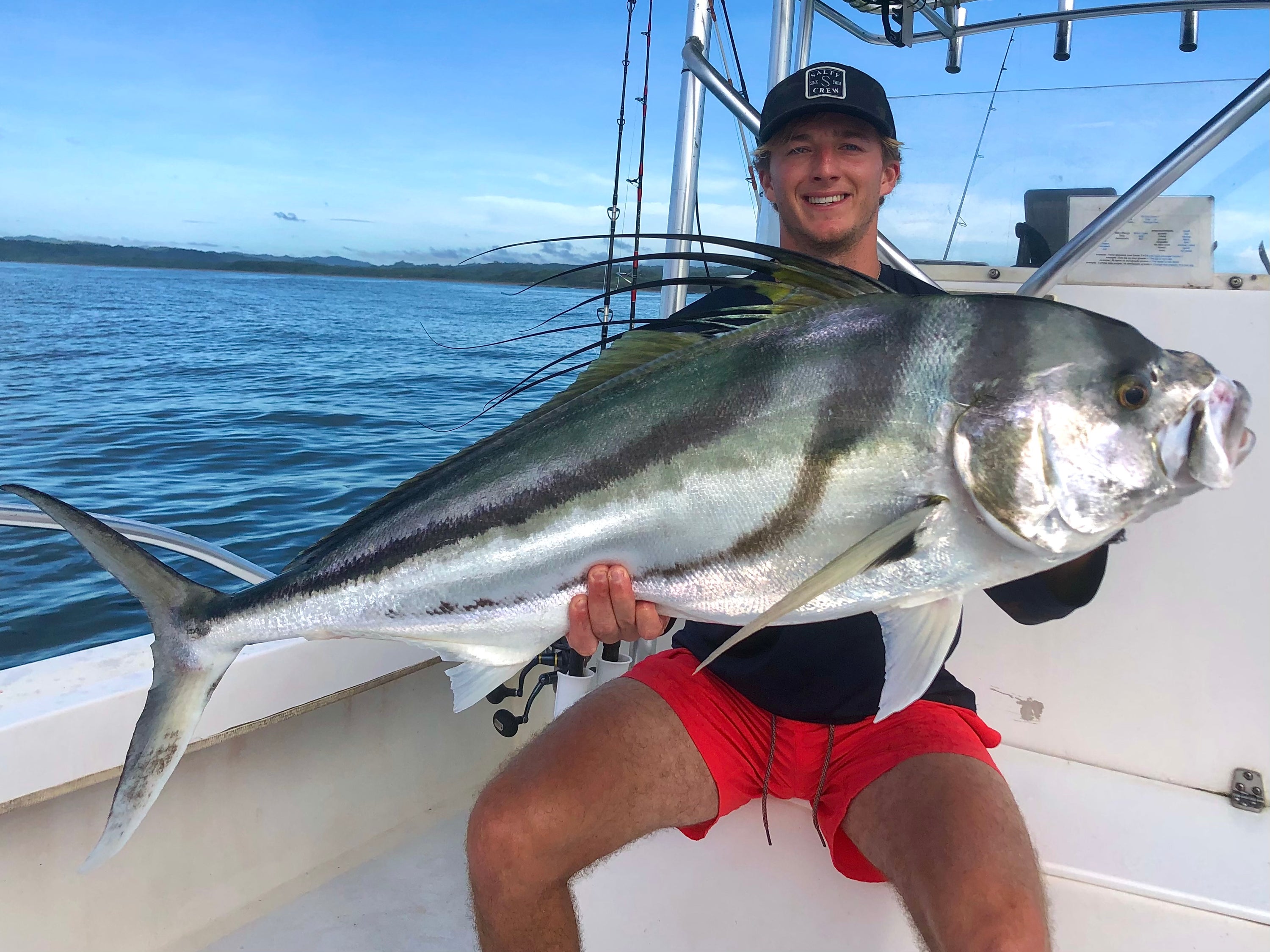 Kieren with a Roosterfish caught popping in Panama