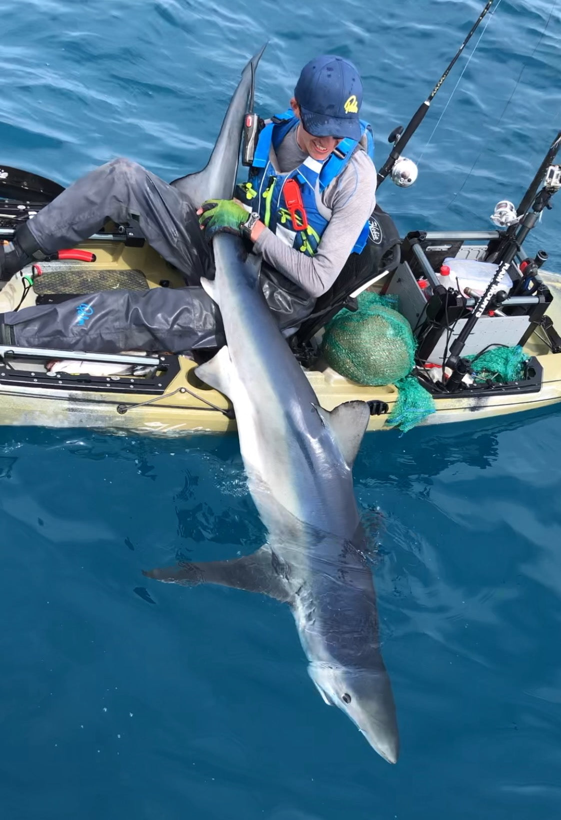 Liam with a Blue Shark caught from his fishing kayak
