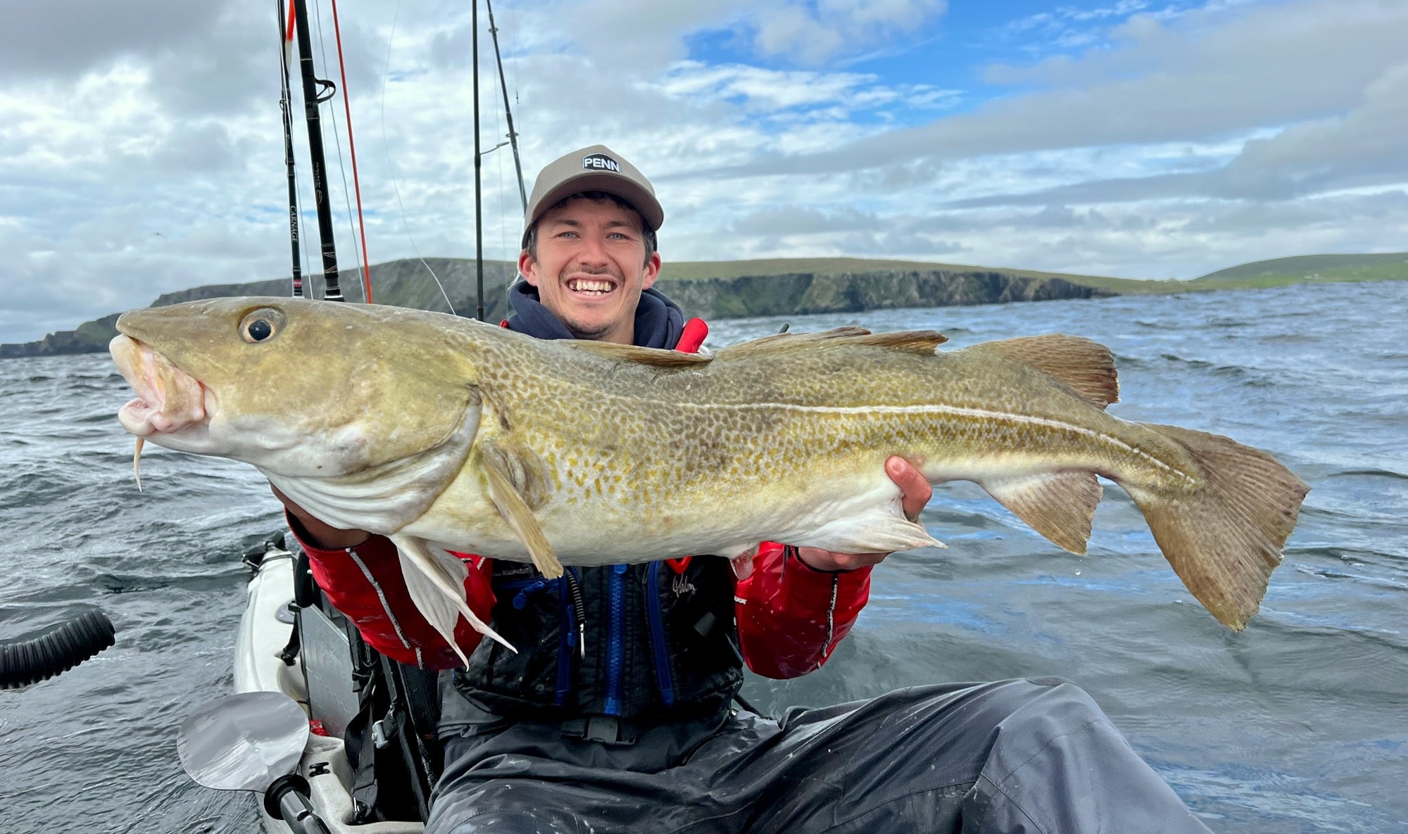 Liam with a kayak caught Cod from Shetland