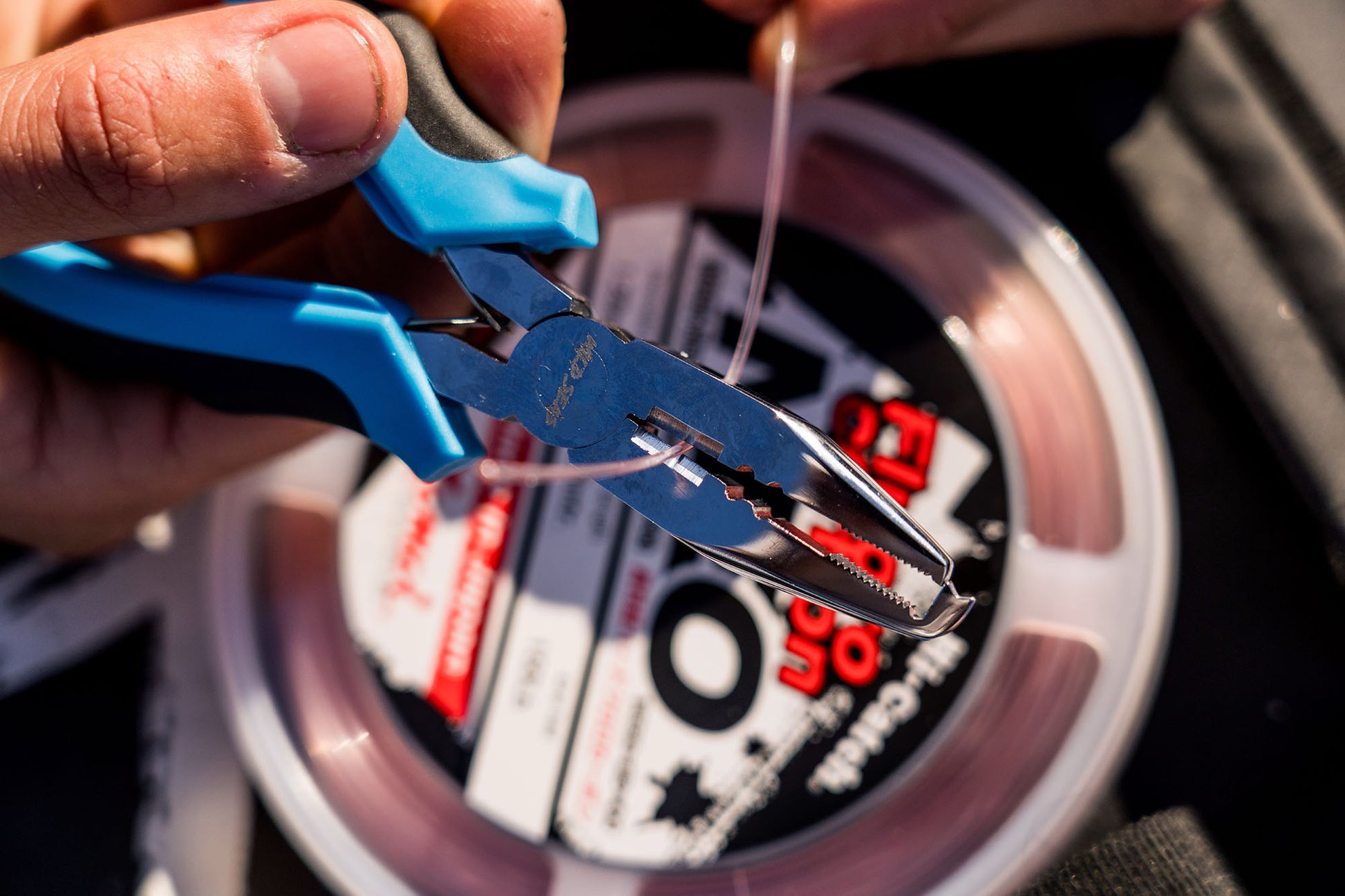 Cutting thick fluorocarbon leader line with the Wild Seas Big Game Pliers