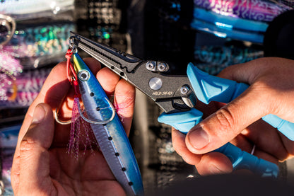 Removing a split ring from a fishing jig with the Wild Seas Super Grip Pliers