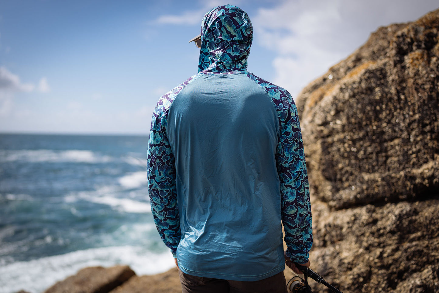 Back view of the Wild Seas Performance UV Hoodie in Bluefin Camo